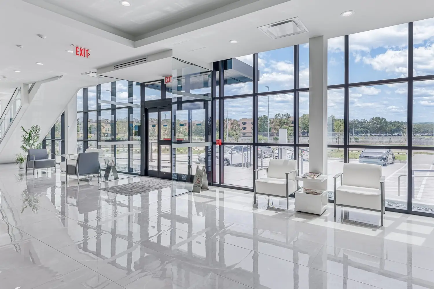 The entrance lobby, with polished floors and full-height glazing